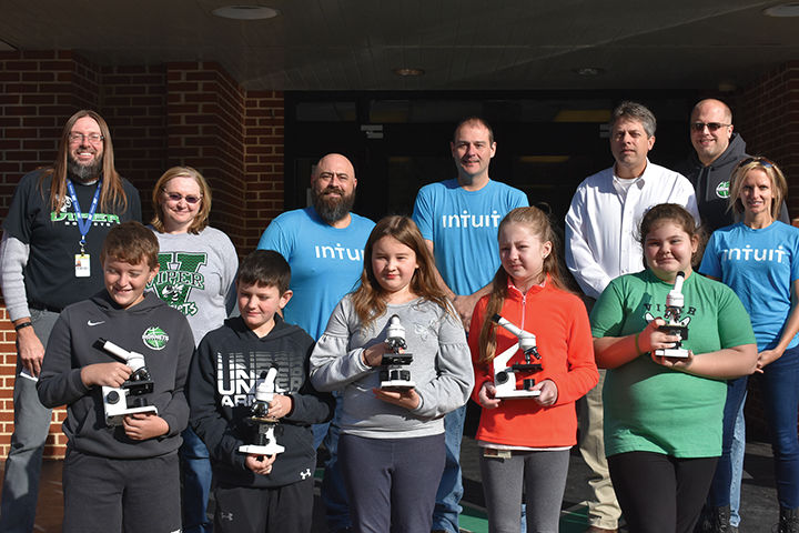 SYKES and Intuit donate microscopes to Viper Elementary students